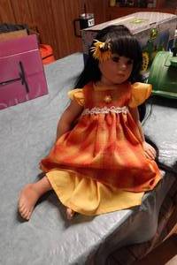 lot 222 image: Chyna Porcelain Doll by Donna RuBert