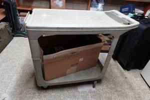 lot 283 image: Rubbermaid Rolling Cart with Box of VHS Movies