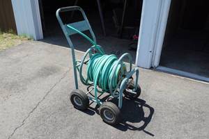 lot 10 image: Yardworks Garden Hose Reel and Hose