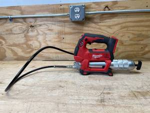 lot 31 image: Milwaukee M18 18V Lithium-Ion Cordless Grease Gun 2-Speed Model # 2646-20 - Tool-Only