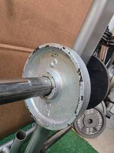 Lot of a pair of 10LB 2-inch Weight Plates (USED). Storage Rack not included