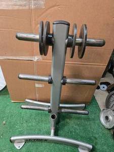 Lot of Four 5LB 2-inch Weight Plates (USED). Storage Rack not included