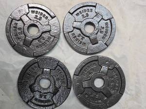 lot 24 image: Lot of a Four 2.5LB One Inch Plates