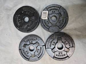 lot 25 image: Lot of a Four 2.5LB One Inch Plates
