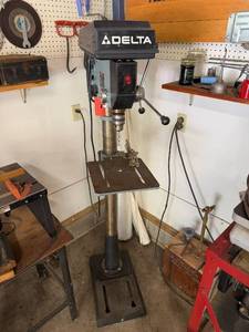 lot 9 image: Delta Floor Standing Drill Press with Adjustable Table