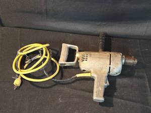 lot 21 image: Used Heavy-Duty Electric Drill with Side Handle