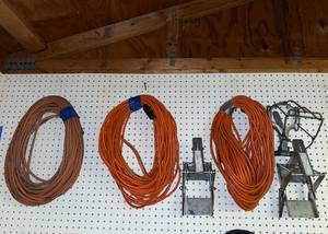 lot 35 image: Set of 3 Heavy-Duty Extension Cords with Reel Holders