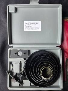 lot 90 image: Large Holesaw Kit with Assorted Drill Bits and Grinding Wheels