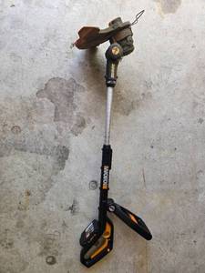 lot 142 image: Used WORX 20V PowerShare Cordless String Trimmer