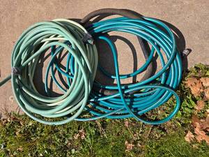 lot 176 image: Set of Garden Hoses - Green and Blue