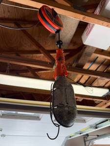 lot 220 image: 20ft Retractable Reel Work Light with Metal Cage