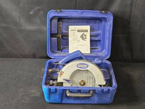 lot 16 image: Benchtop Pro 7 14 Circular Saw with Case and Manual