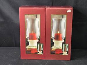 lot 73 image: Set of 2 Lenox Holiday Hurricane Candle Holders with Pillar Candle