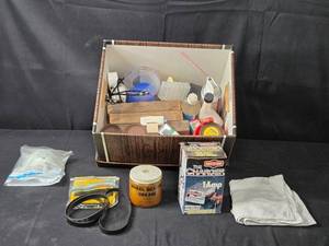 lot 89 image: Assorted Household and Automotive Items Including Battery Charger and Vacuum Belts