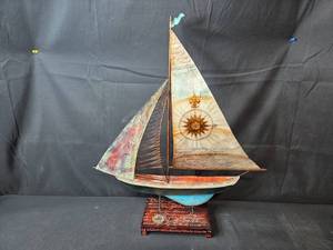 lot 108 image: Artisan Metal Sailboat Model with Decorative Sails