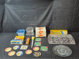 lot 111 image: Assorted Household Items Including Glass Platters, Coasters, and Storage