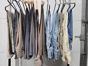 lot 121 image: Assorted Collection of Levis Jeans, Pants and Faux Fur Slippers