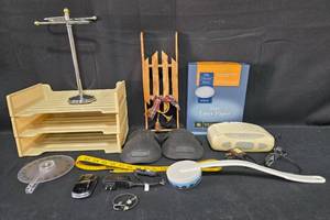 lot 123 image: Assorted Office and Household Items Including Paper Trays, Phone, and Lamp