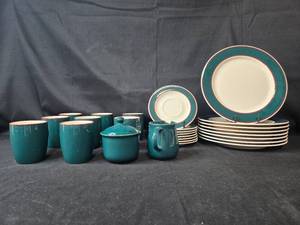 lot 158 image: Fusions Evergreen & Raspberry by Nancy Calhoun Elegant Dinnerware Set with Teal and White Design