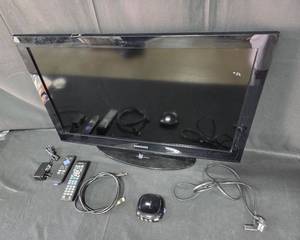 lot 173 image: Samsung 32-Inch LCD TV with Remote and Accessories
