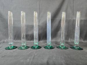 lot 192 image: Set of 6 Tall Clear Glass Bud Vases with Green Base