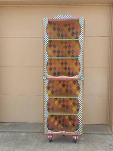 lot 196 image: Colorful Harlequin Bookshelf