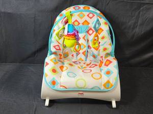 lot 229 image: Fisher Price Colorful Infant Rocker Seat with Toys