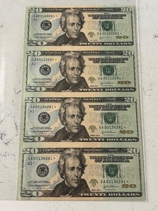 lot 3 image: Uncut Sheet of 2004 A $20 Dollar Star Notes