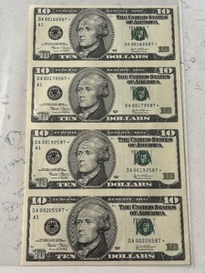 lot 4 image: Uncut Sheet of 2003 $10 Dollar Star Notes