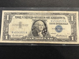 lot 179 image: 1957 Blue Seal $1 Dollar Silver Certificate