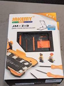 lot 1046 image: Jakemy Smart Phone Repair Holder JM-Z13