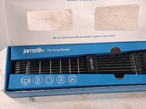lot 1083 image: Jamstik 3.7V 1650 mAh Smart Guitar JSI152100