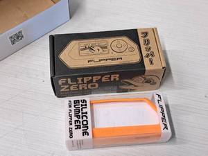 lot 1101 image: Flipper Zero Electronic Pet Toy and Multi-Tool Educational Device (w Silicone Bumper)