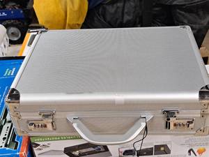 lot 1134 image: Solo New York Fifth Avenue Attache Security Briefcase (fits 17.3) (Silver)