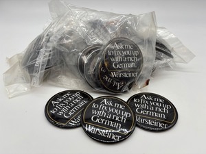 lot 202 image: Over 50 Warsteiner Promotional Tin ButtonsPins