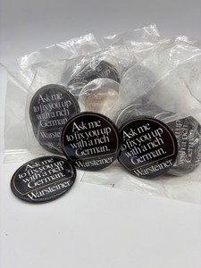 lot 204 image: Over 50 Warsteiner Promotional Tin ButtonPins