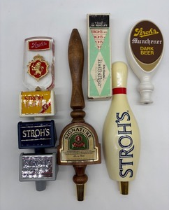 lot 236 image: Collection of 8 Strohs Vintage Beer Tap Handles and Rediclips