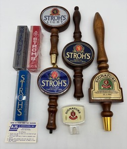 lot 238 image: Collection of 8 Vintage Strohs Beer Tap Handles