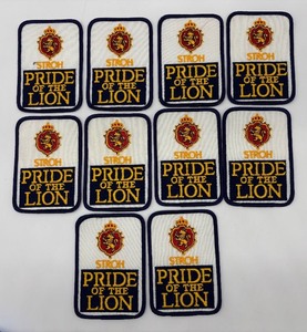 lot 241 image: Set of 10 Strohs Patch Pride of the Lion Embroidered Badges