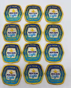 lot 245 image: Collection of 12 Molson Light Imported From Canada Patches