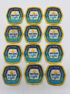 lot 247 image: Set of 12 Molson Light Imported from Canada Embroidered Patches