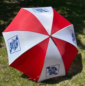 lot 252 image: Large Pabst Blue Ribbon Red and White Umbrella