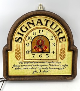 lot 280 image: Vintage Stroh Signature Wall Clock with Brewery Design