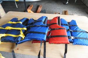 lot 182 image: NEW (4ct) Onyx Nylon Life Jackets