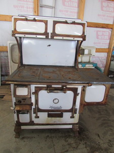 lot 25 image: Monarch Malleable Wood Burner Antique
