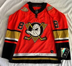 lot 21 image: Teemu Selnne New With Tags Anaheim Mighty Ducks Jersey Size 52 - Addidas NHL Authentic Hockey Jersey