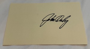 lot 12B image: John Daly Signed Card From Charity Golf Auction