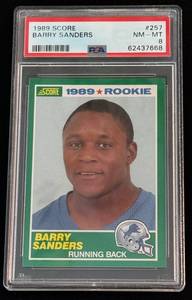 lot 5C image: Barry Sanders RC PSA 8 NM-MT 1989 Score #257 Rookie Football Card