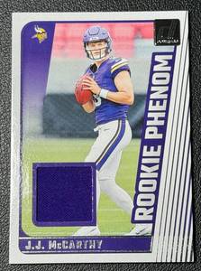 lot 51A image: JJ McCarthy Relic Patch RC 2024 Donruss Rookie Phenom #RPJ-JJM Minnesota Vikings Football Card
