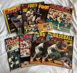 lot 136A image: (8) 1980s Topps Baseball and Football Sticker Albums Plus New Box of 1984 Baseball Stickers